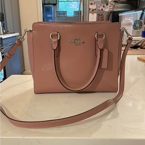 Coach, mauve colored hand bag
